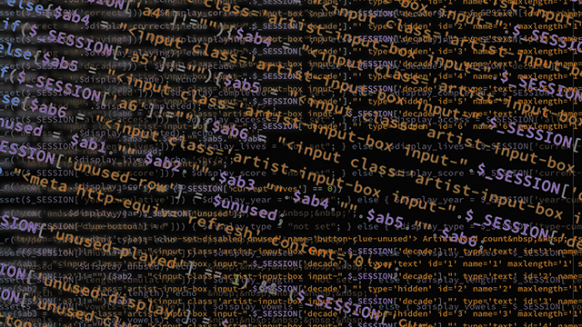 lines of orange and purple computer code over a black background